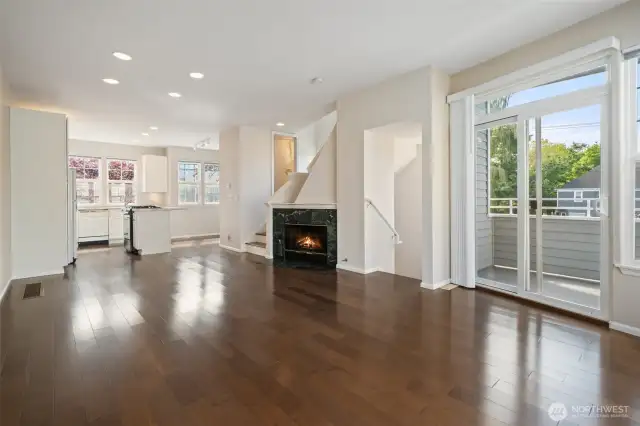 Open living room without virtual staging, shows off the floors!