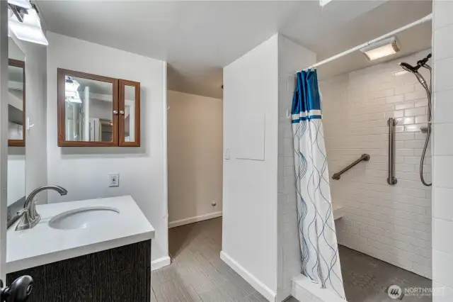 This is a beautifully tiled, spacious 3/4 bath located on the lower level of the home.  Check out the beautiful tile work on the floor and in the shower, STUNNING in person