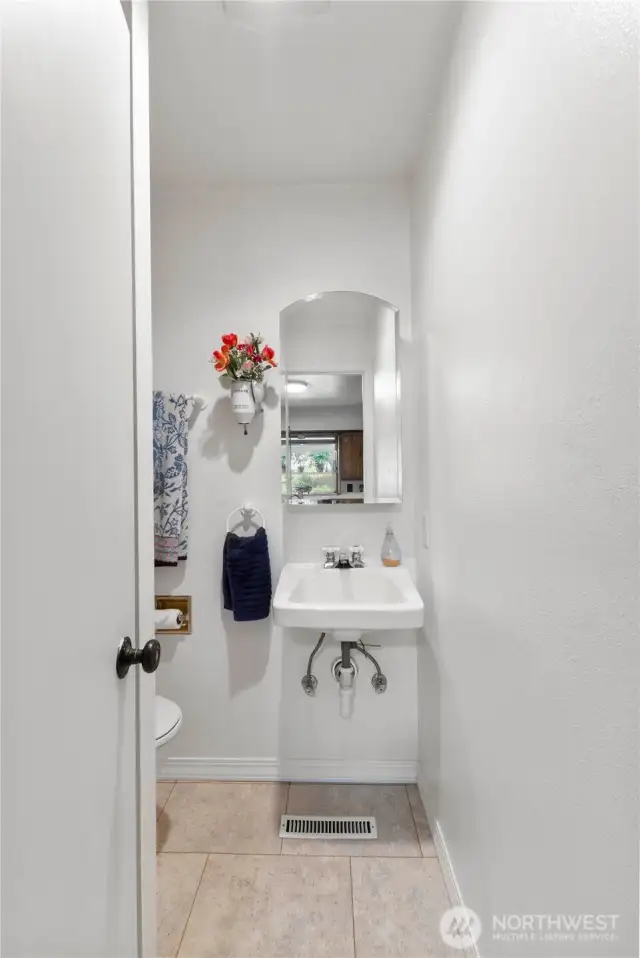 Three quarter bathroom off the kitchen garage entrance