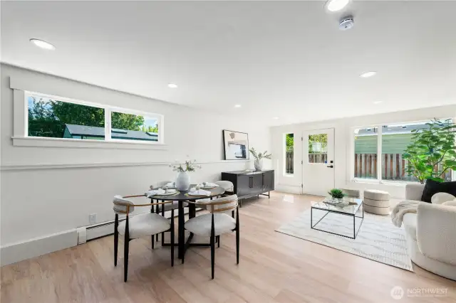 Second family room with wet bar with door to the driveway