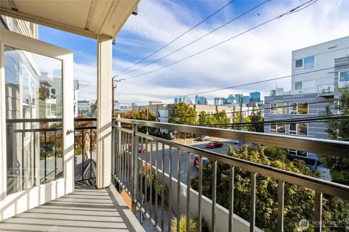 Take in the city on your private balcony with your favorite morning beverage.