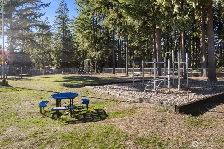 The Playground and park area behind the Clubhouse for your enjoyment!