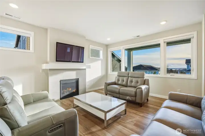 Living Room with Gas Fireplace. Lots of Natural Light
