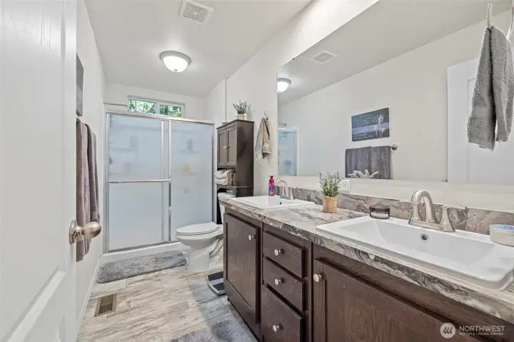 Primary Bath with walk in shower and double sinks