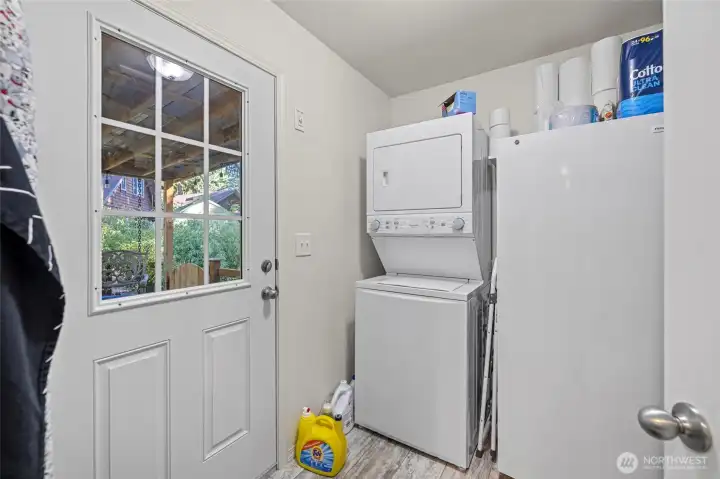 Utility room with door to back deck