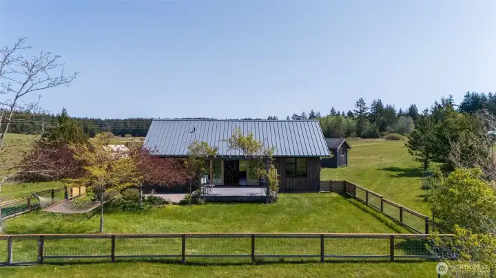 West/back side of house and fenced garden