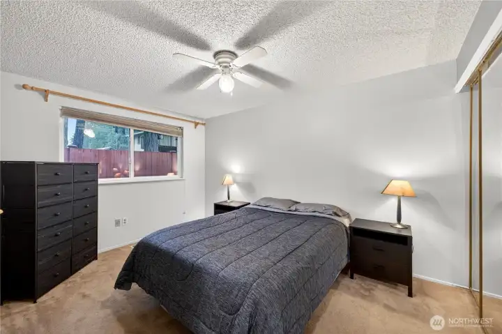 Primary bedroom with ceiling fan