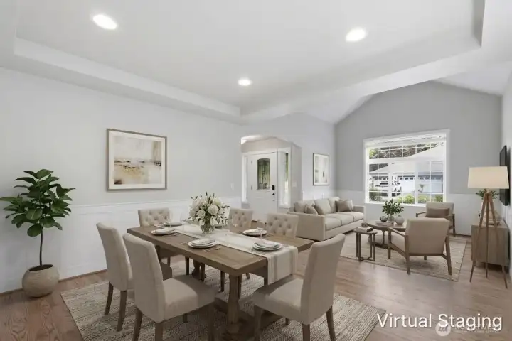 Virtually staged front living room and dining area