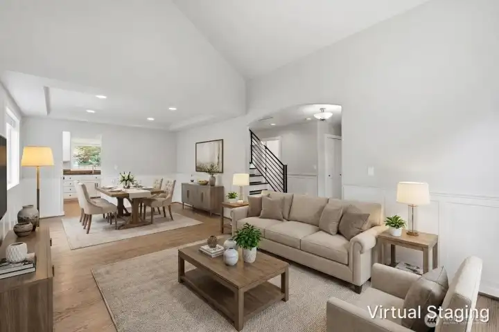Virtually staged front living area and dining area