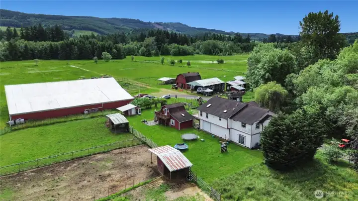 Equestrian estate with 33 flat acres and an indoor arena!