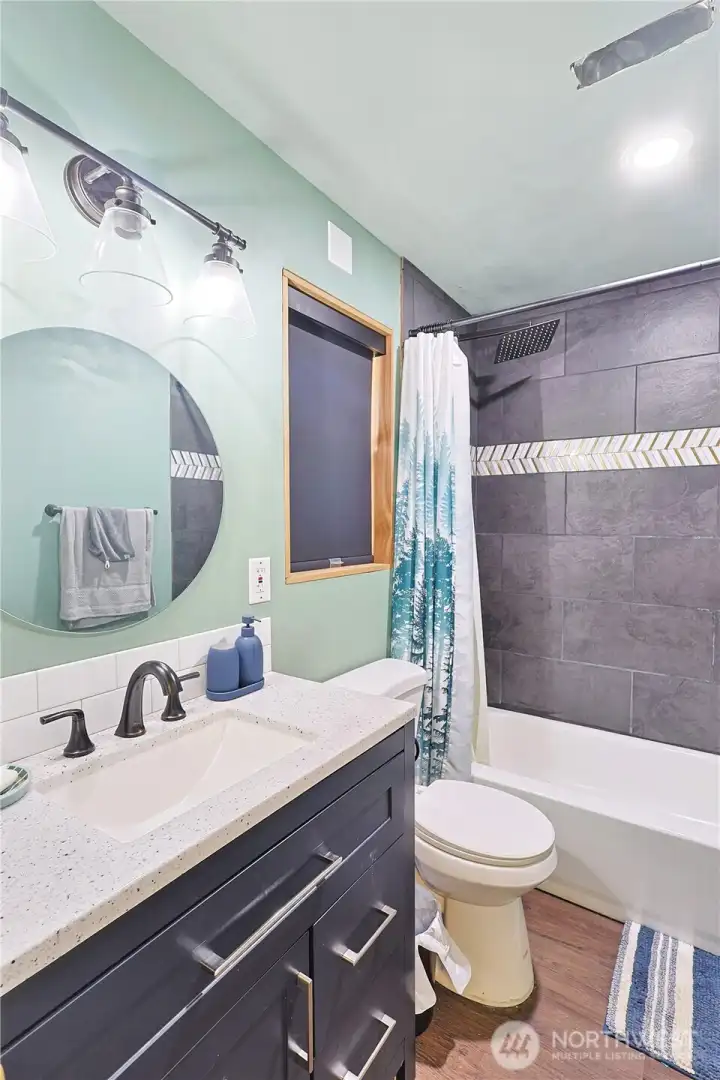 Extra finished bathroom in garage for easy second living space on lower level.