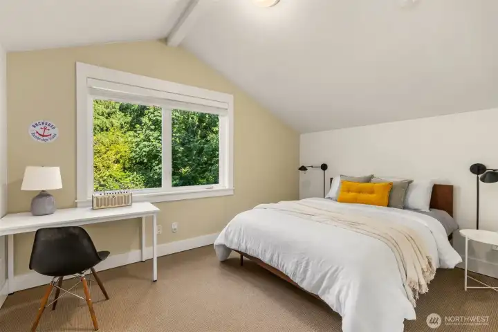 A separate room within the bonus space creates opportunities for work, creativity, exercise, or relaxation.