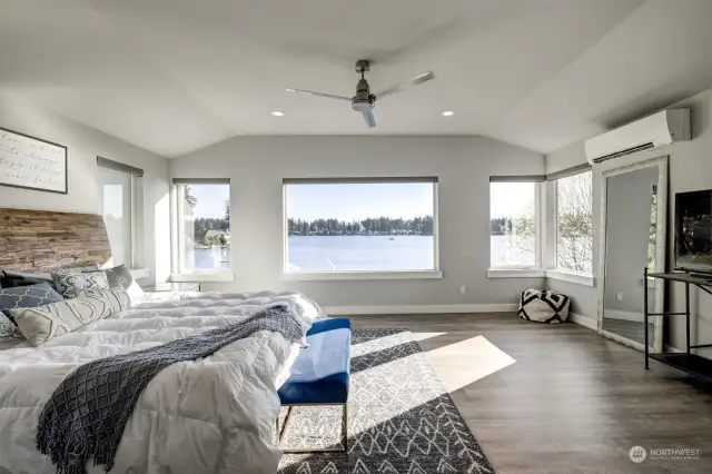 180 Degree views of Lake Sawyer from your bed!  Custom electric black out blinds on all 6 windows!