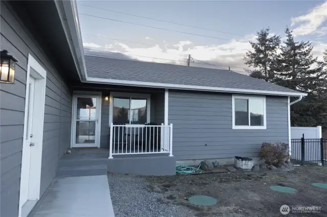 Extra long garage addition with extended porch and sidewalk are just some of the new updates this home has to offer.