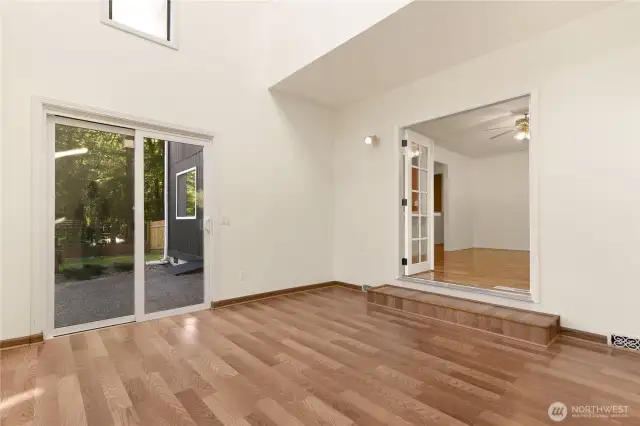Addition off living area and kitchen looking to patio