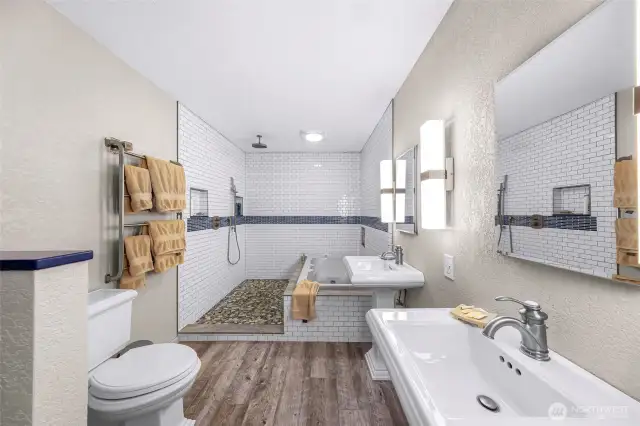 Newly remodeled. Tile shower, jetted tub, rain shower & heated tile floors
