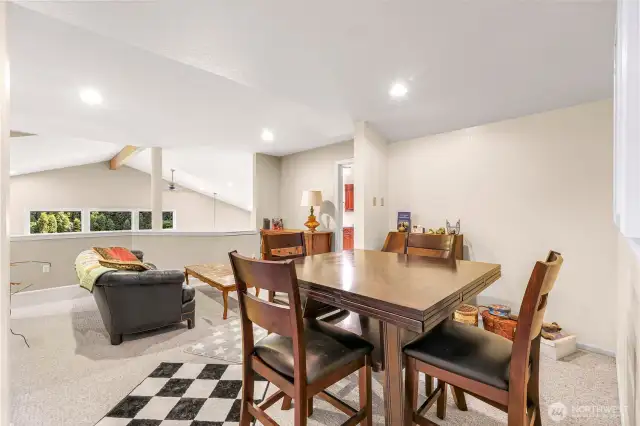 2nd floor living space overlooks main floor kitchen and living room