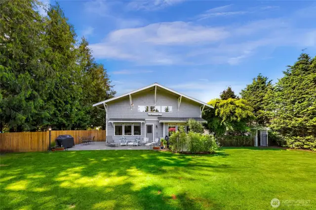 Expansive, fully fenced back yard