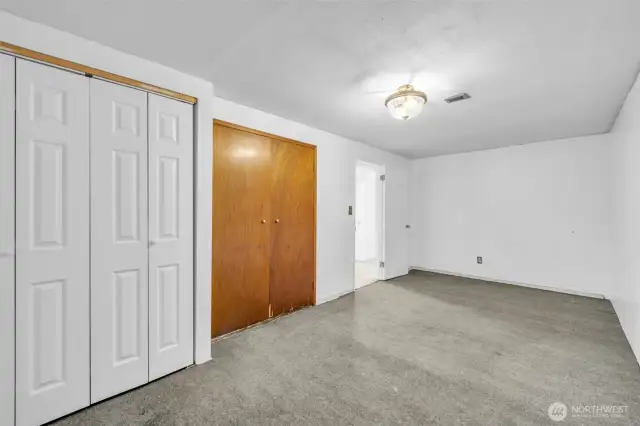Lower level Bedroom 3 with new closet doors