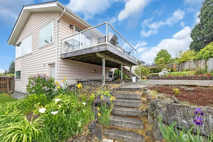 Stairs leading to the Patio/Firepit and lower level terrace