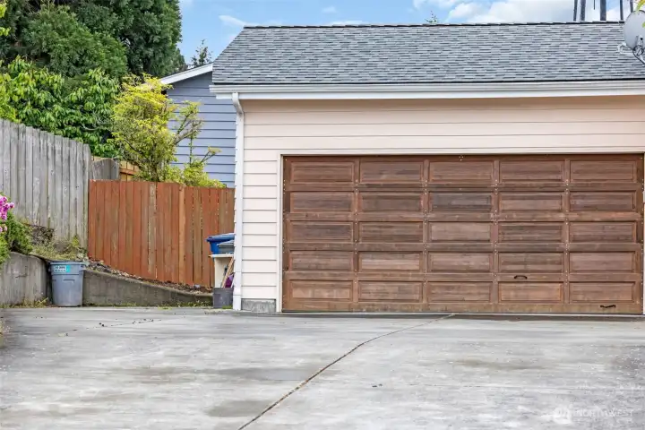 Newer Garage doors and plenty of driveway parking space