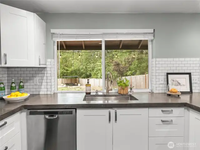 Enjoy backyard views from the kitchen window.