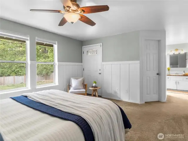 Primary bedroom with access to the backyard.