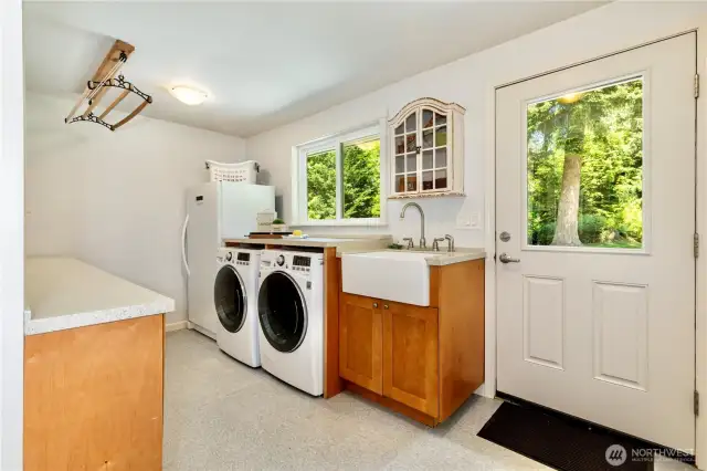 Utility/Mudroom conveniently located nearest the barn, driveway & greenhouse