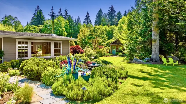 Professionally landscaped with deer-resistant materials.
