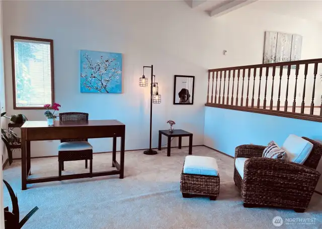 Living room with view of dining room above