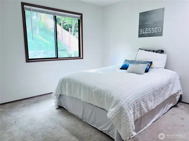 Bedroom 4 quietly located in upper NW corner of home with window facing west and backyard. Large closet for storage.