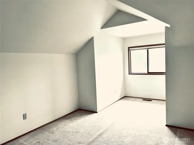 Large bonus room in mid level which can be used as an extra bedroom, office or playroom