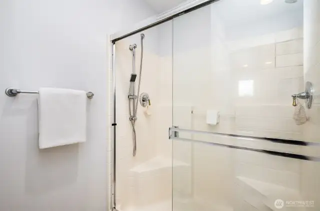 Room for two in this shower with dual showerheads.