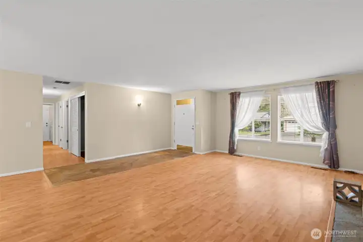 living room when walking in from front door - hallway to bedrooms