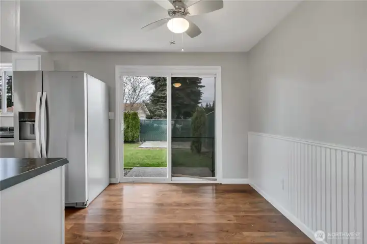 Good sized dining room with wainscoating & slider to back patio.