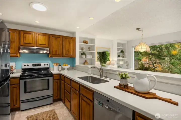 Updated kitchen features Corian counters, Bosch diswasher, GE Profile Range and LG refrigerator.