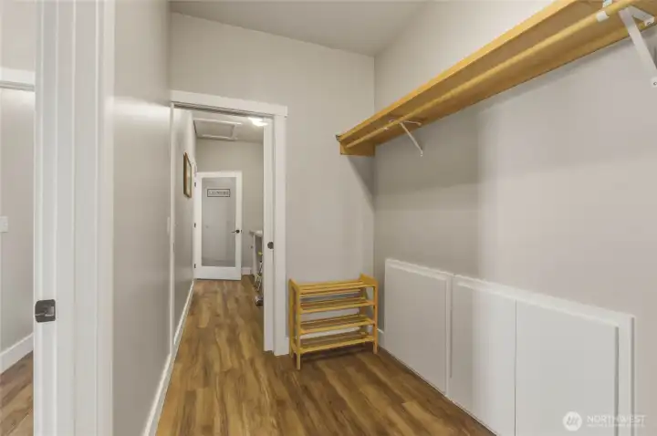 Master walk in closet - walk through to laundry room
