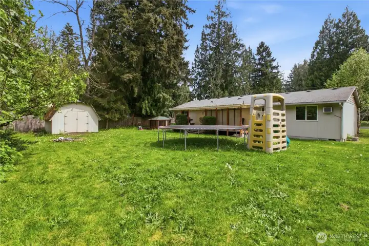 Hot tub, gazebo, fire pit and storage shed.