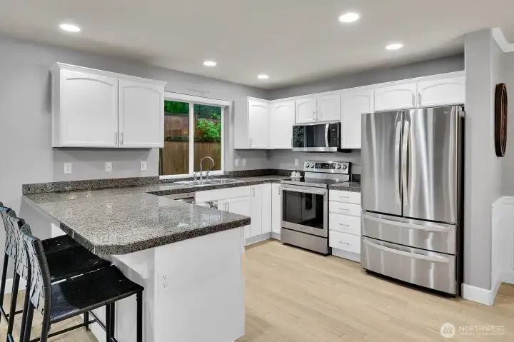 Kitchen w/ Granite Countertops and New SS Appliances