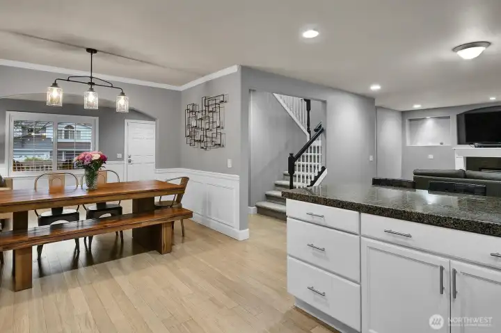 Kitchen View to Dining and Stairway to Upstairs