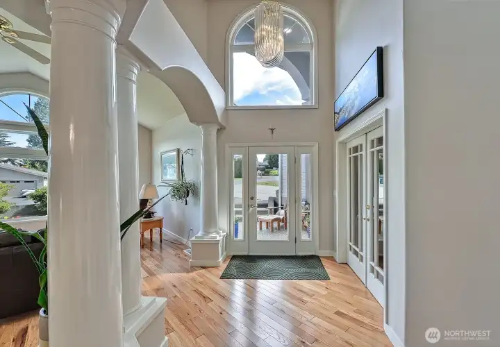 Grand entry way flooded with natural light.