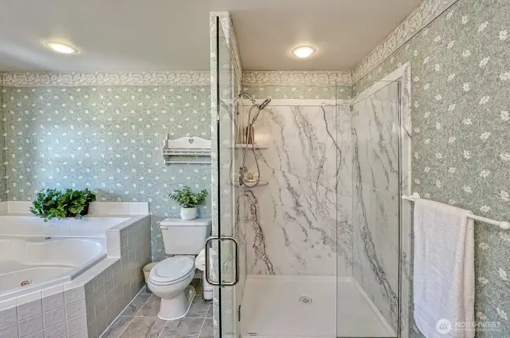 Stunning new walk in shower in primary suite.