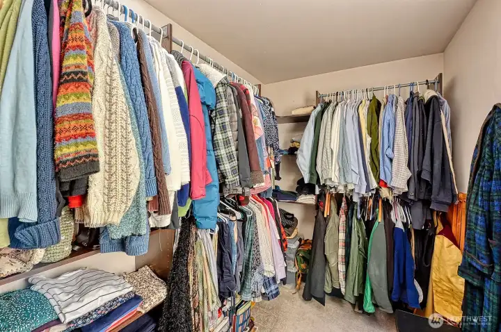 Spacious walk in closet with skylight.