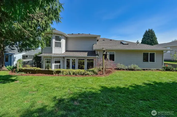 Peaceful and private backyard with lower patio.