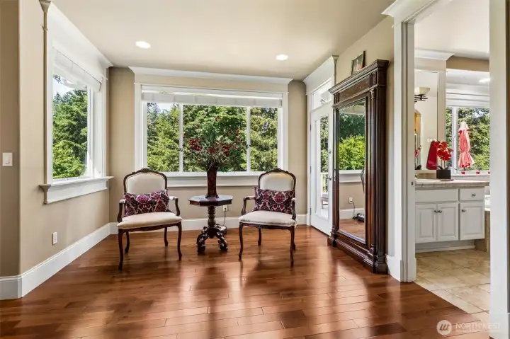 Luxurious Primary Suite Walks Out to the Deck, with 5-piece En-suite, Jetted Tub, Walk-in Closet.