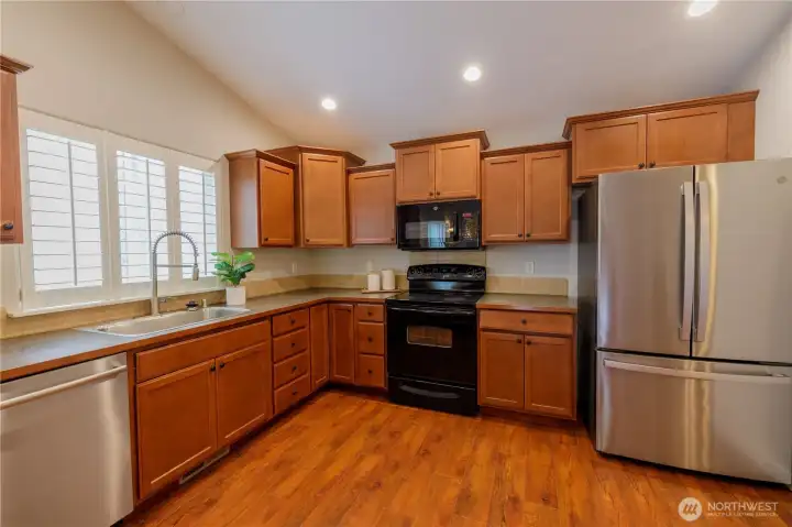 Lots of countertop and cabinet storage here.