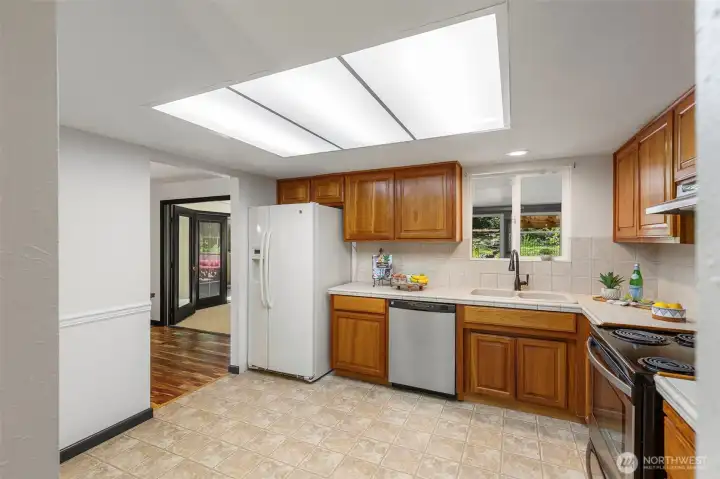 Plenty of countertop workspace and cabinetry make this kitchen as functional as it is inviting.