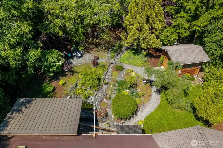 Nearly an acre of property offers room to garden, play, or simply enjoy nature.