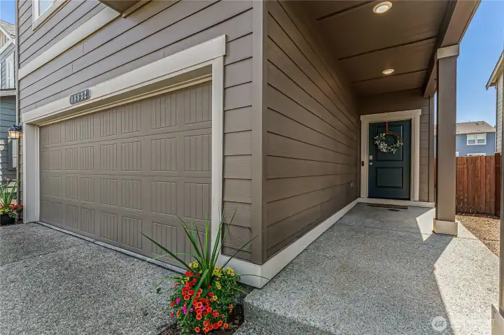 The covered entry will welcome you home.