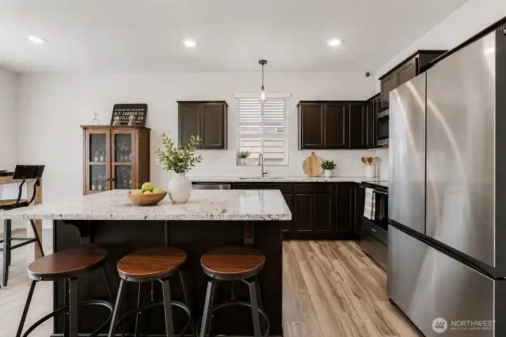 Recently added granite counters and tile backsplash.